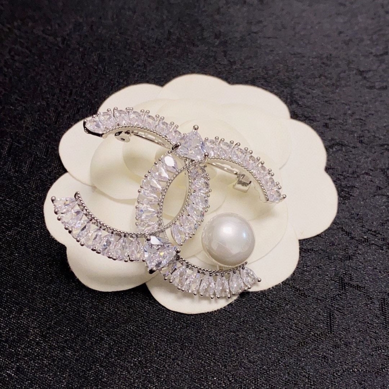 Ch**el brooches